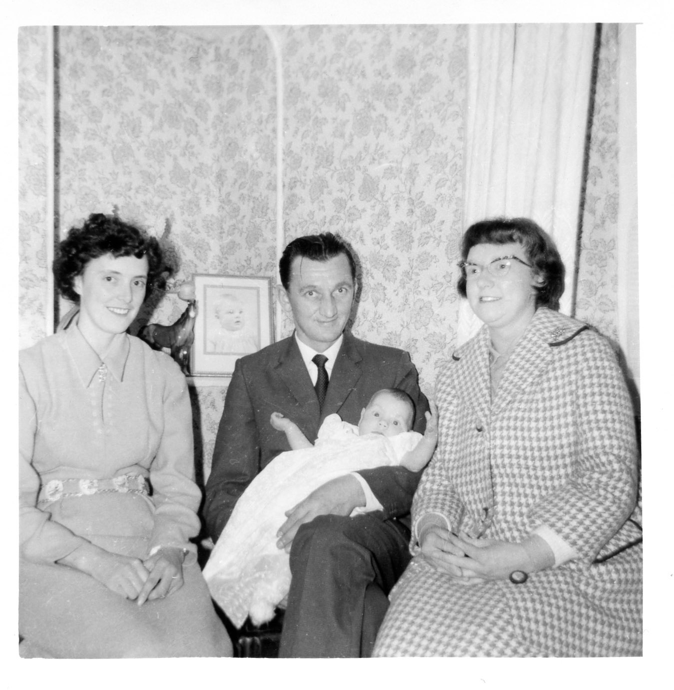 Jude and godparents at baptism